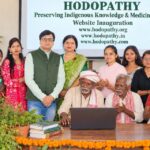 Rajeev Singh with Rimi Singh, Adivasi elders, traditional knowledge holders and community members at the inauguration of three Hodopathy websites in Giridih, Jharkhand, on 8 October 2026.