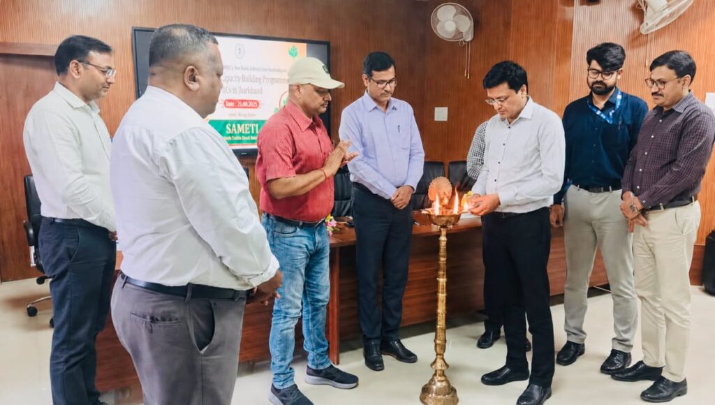 Rajeev Singh of Sansar Green lighting the ceremonial lamp with the Director of Agriculture, Jharkhand, and Director of SAMETI at the agriculture export workshop in Ranchi.